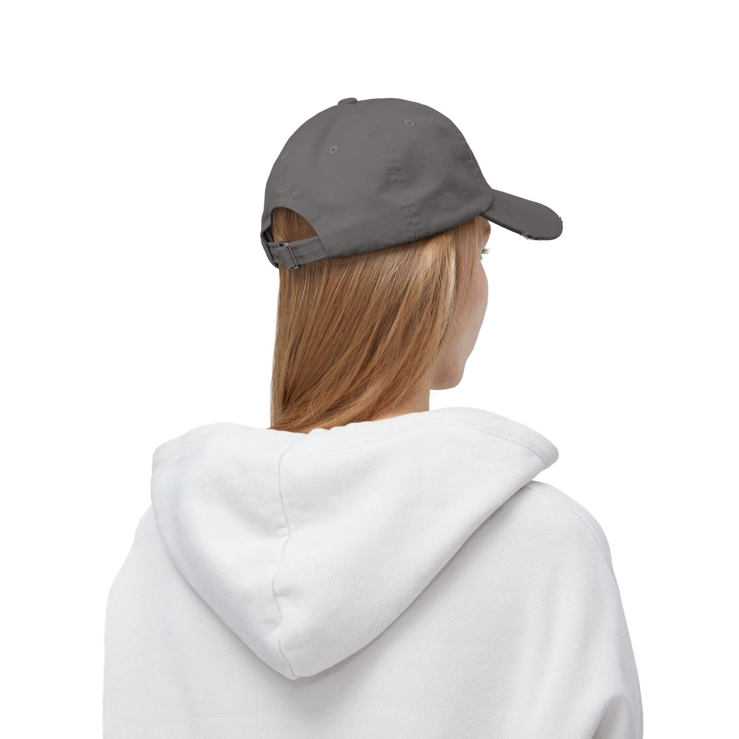 Person wearing a gray cap and white hoodie on a white background