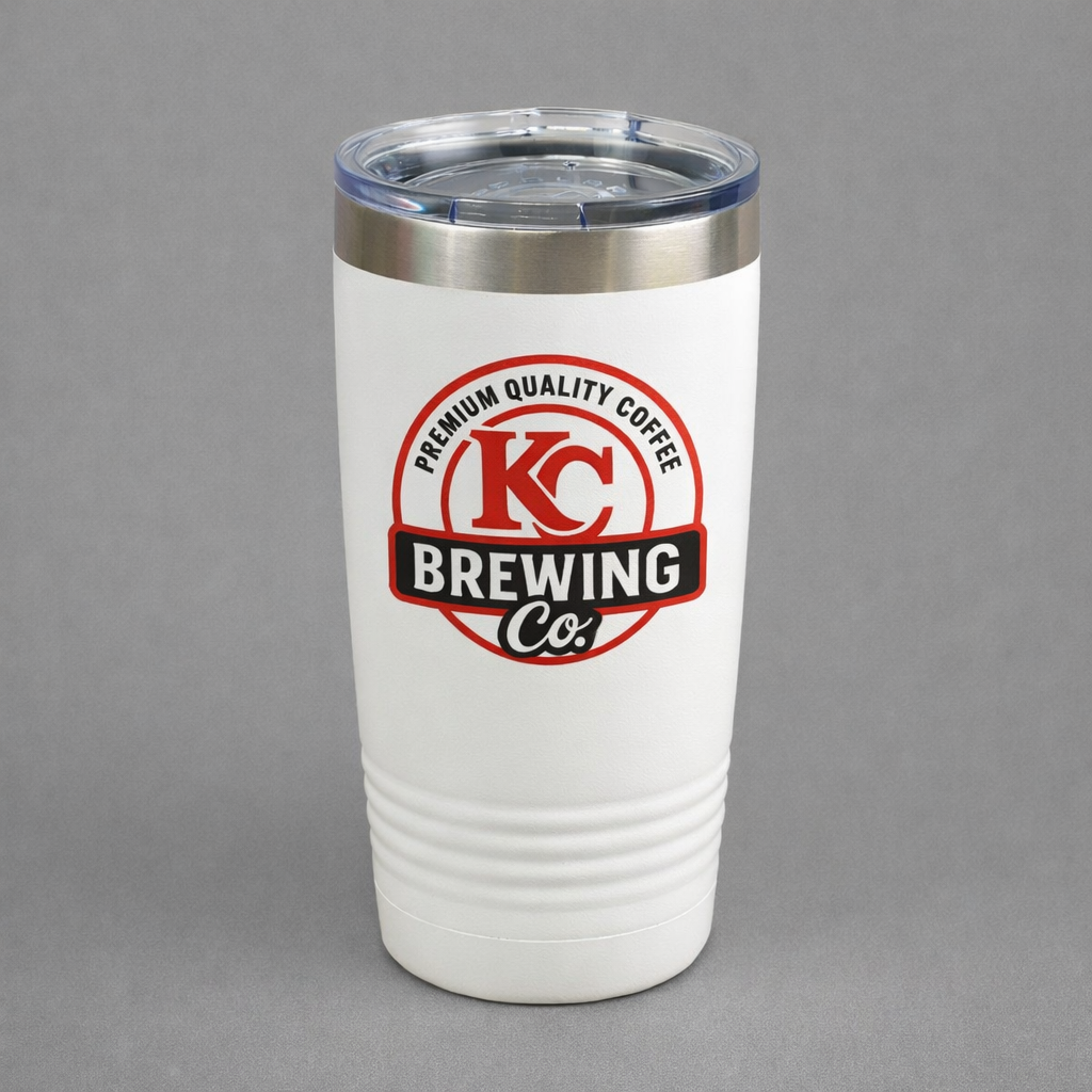White insulated tumbler with clear lid featuring KC Brewing Co logo and premium quality coffee text