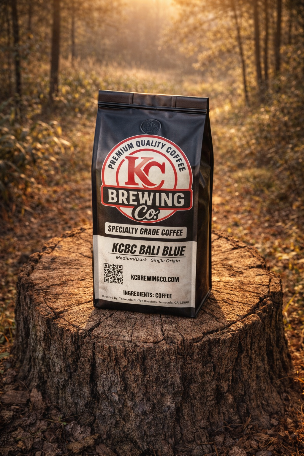 KC Brewing Co KCBC Bali Blue medium dark specialty grade coffee bag on tree stump in forest