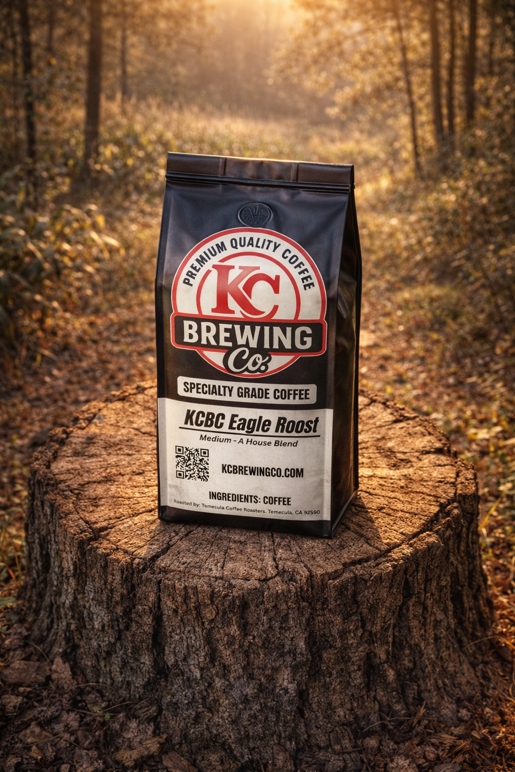 KC Brewing Co medium roast specialty grade coffee bag labeled Eagle Roost on tree stump in autumn forest